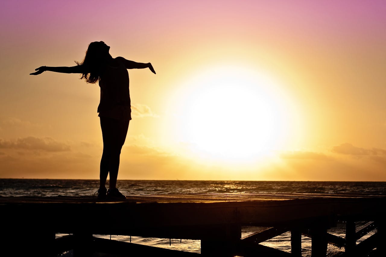 Women at Sunset at Ocean