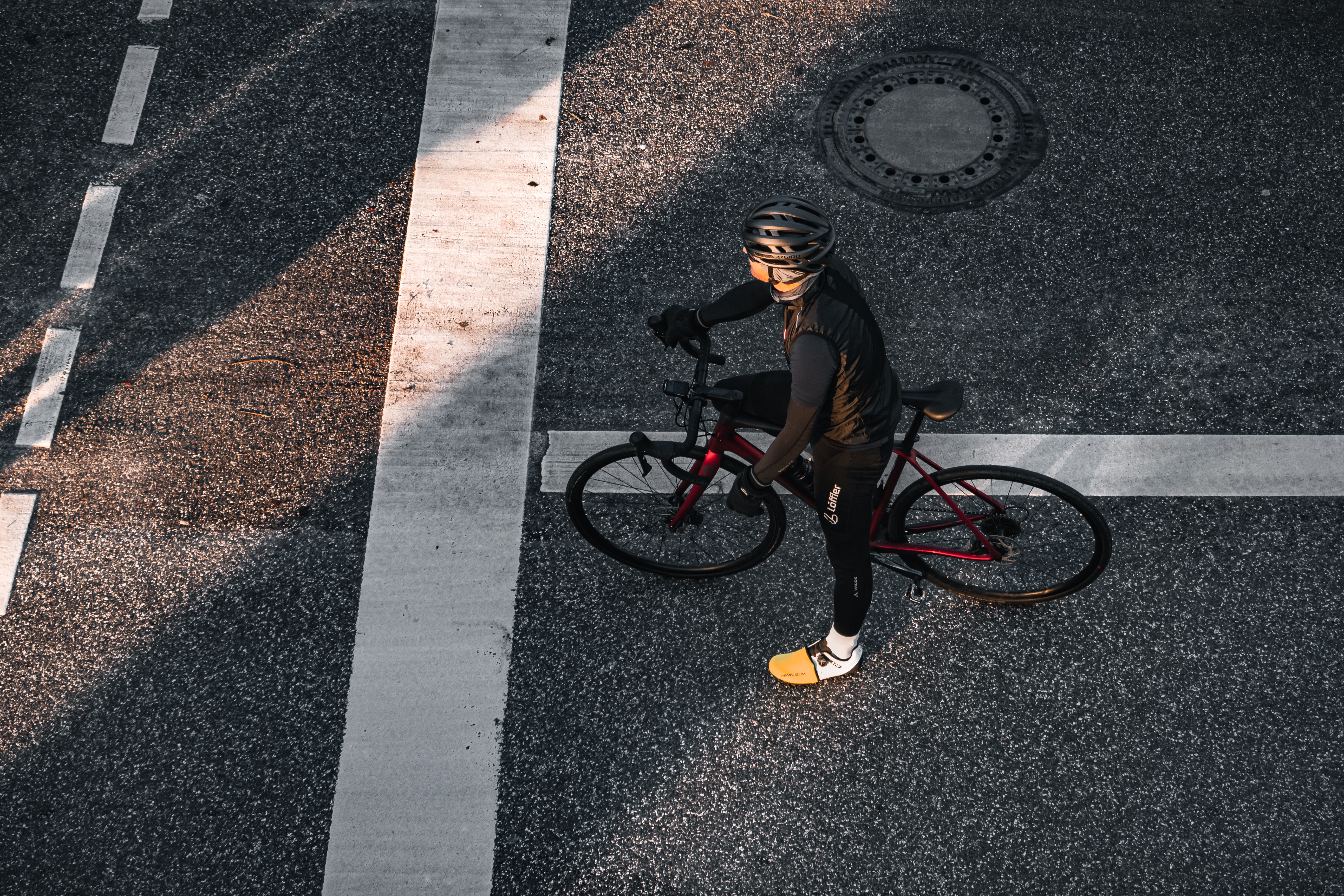 aerial view of man on bike on the street