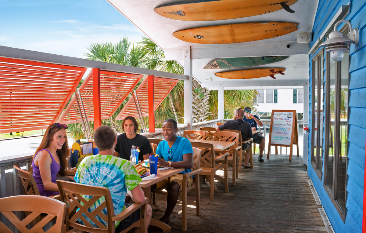 Picture of people sitting down in beach restaurant