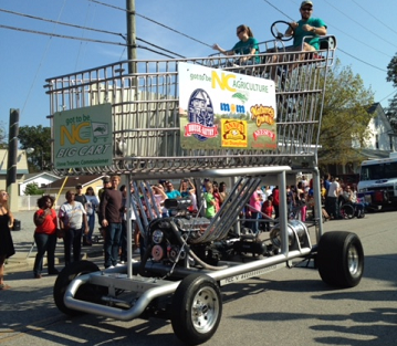 Giant shopping cart parade vehicle