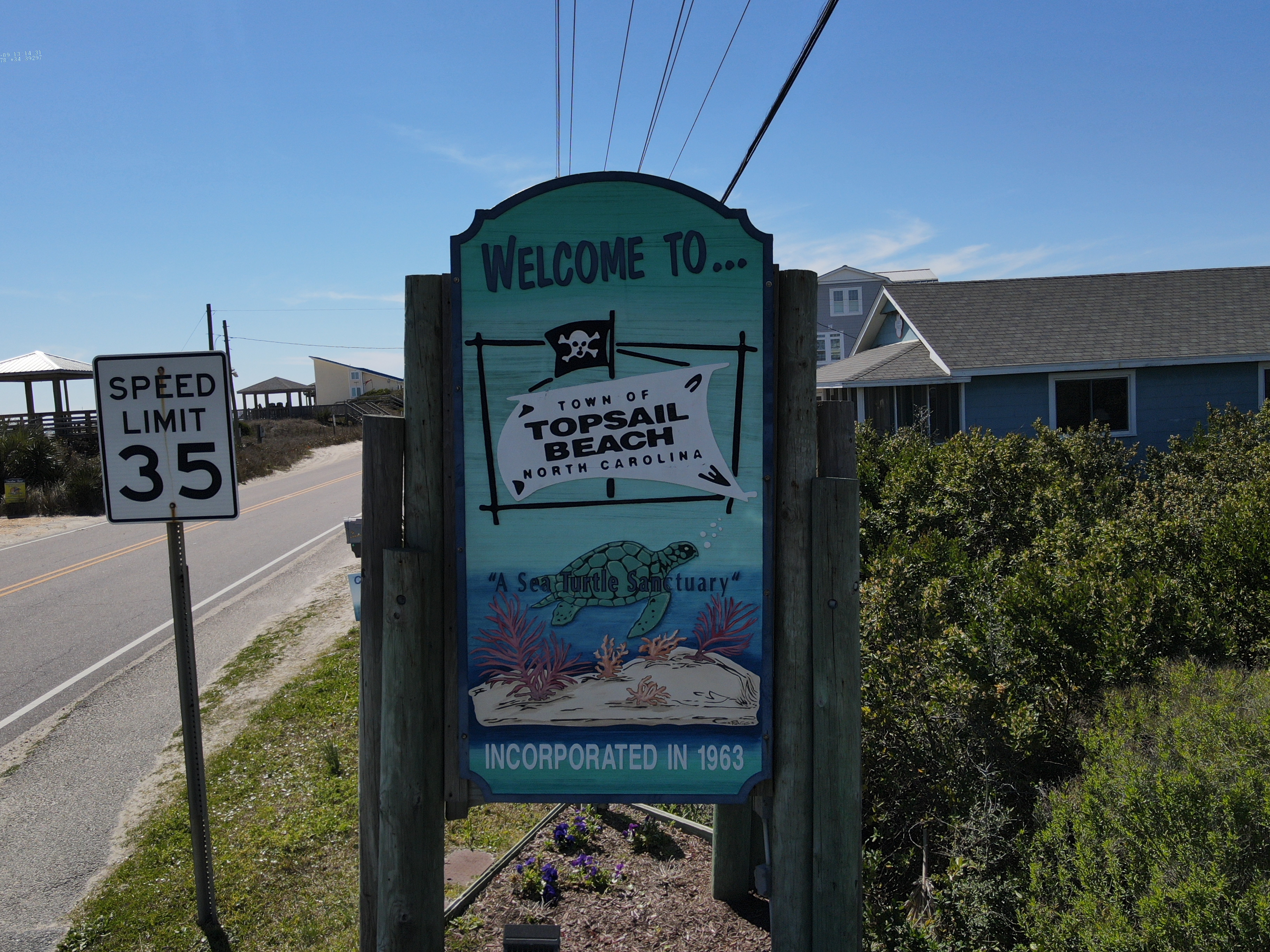 A welcome to Topsail Island sign