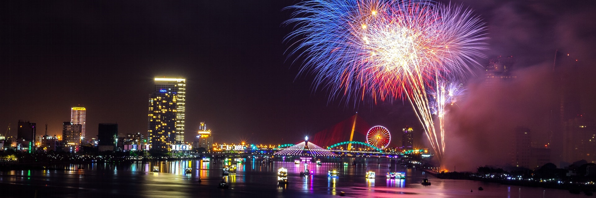 fireworks over a river