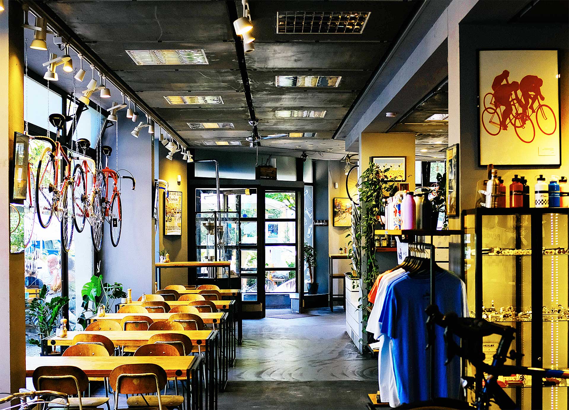 bike store with bikes hanging from the ceiling and accessories