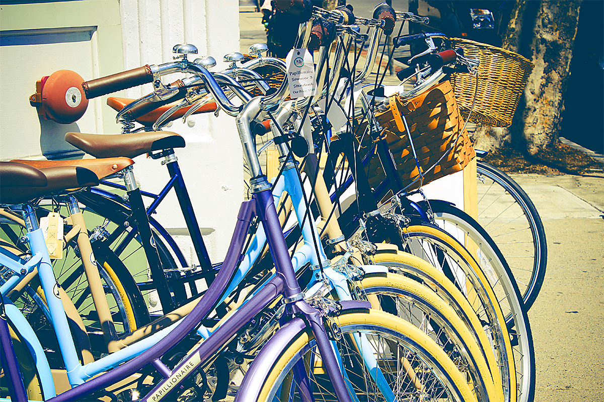 multiple assorted cruiser bicycles in different colors